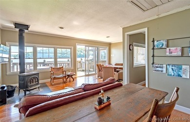 Originally a Quonset hut, this unique lakefront property blends - photo 14