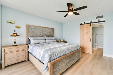 Wake up to panoramic water views from this beautifully - photo 15