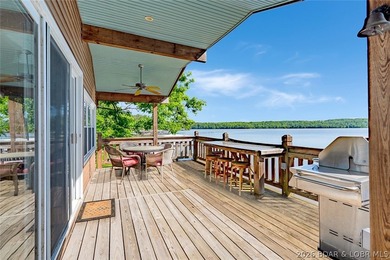 Originally a Quonset hut, this unique lakefront property blends - photo 16