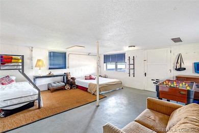 Originally a Quonset hut, this unique lakefront property blends - photo 21