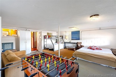 Originally a Quonset hut, this unique lakefront property blends - photo 22