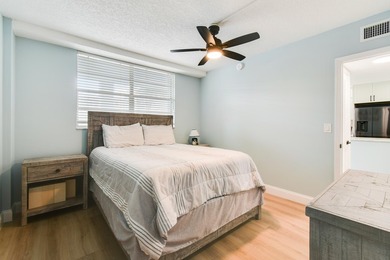 Wake up to panoramic water views from this beautifully - photo 24