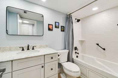 Wake up to panoramic water views from this beautifully - photo 25