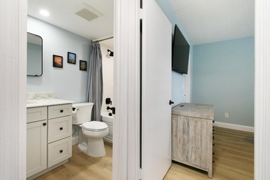 Wake up to panoramic water views from this beautifully - photo 26