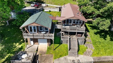 Originally a Quonset hut, this unique lakefront property blends - photo 30