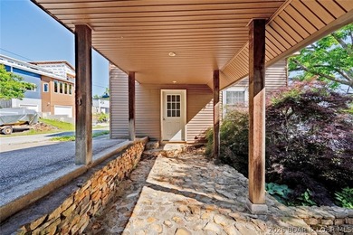 Originally a Quonset hut, this unique lakefront property blends - photo 32