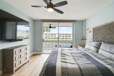 Wake up to panoramic water views from this beautifully - photo 37
