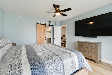 Wake up to panoramic water views from this beautifully - photo 38