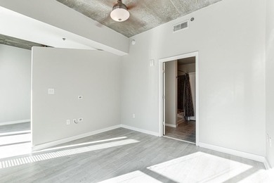 This unique condo offers open-concept living with direct access