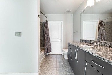 This unique condo offers open-concept living with direct access