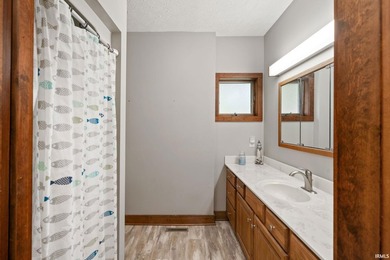 Enjoy lake living with this well-maintained 3-bedroom - photo 19