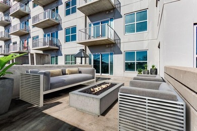 This unique condo offers open-concept living with direct access