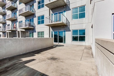 This unique condo offers open-concept living with direct access