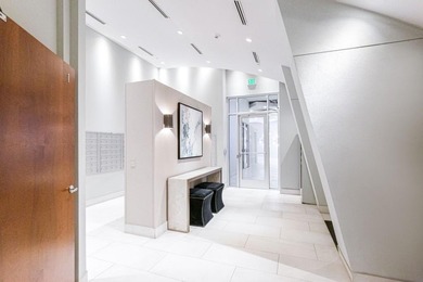 This unique condo offers open-concept living with direct access