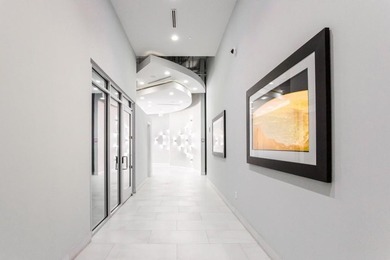 This unique condo offers open-concept living with direct access