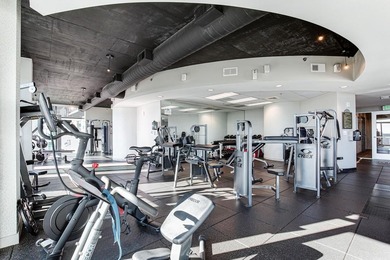 This unique condo offers open-concept living with direct access