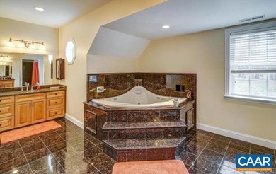 Experience lakefront living at its finest on the private side of - photo 22