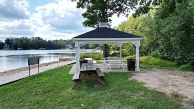 Experience lakefront living at its finest on the private side of - photo 42