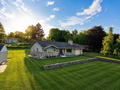 RARE opportunity to own a beautifully updated home just steps - photo 1