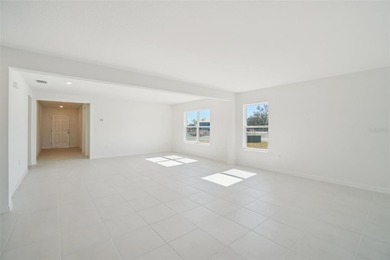 Prepare to be awed by this gorgeous home. As you enter, you will - photo 3