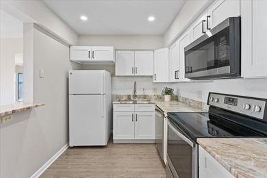 Gorgeous waterfront views, abundant natural light, and a relaxed - photo 10