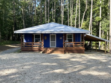 LIKE NEW Lakehouse On Wooded Lot With Great Front Porch - Lake Home For Sale in Pachuta, Mississippi