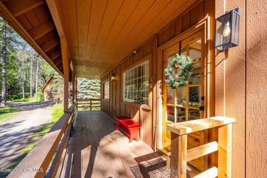 Set along 290 feet of private Upper Pack River frontage on over - photo 11