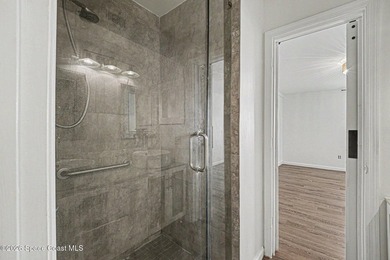 FIRST-FLOOR CONVENIENCE! NEWER A/C UNIT, STUNNING STONE - photo 17
