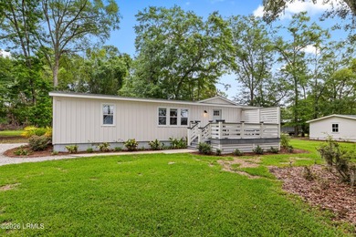 A rare waterfront estate offering over two acres, a private dock - photo 44