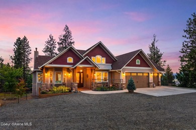 Stunning sunsets frame this custom designed Craftsman that sits - photo 11