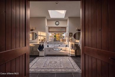 Stunning sunsets frame this custom designed Craftsman that sits - photo 24
