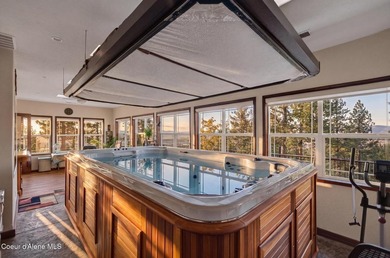 Stunning sunsets frame this custom designed Craftsman that sits - photo 26