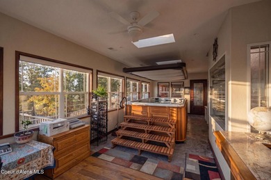 Stunning sunsets frame this custom designed Craftsman that sits - photo 28