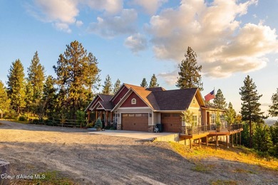 Stunning sunsets frame this custom designed Craftsman that sits - photo 34