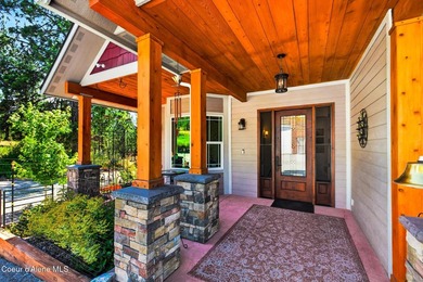 Stunning sunsets frame this custom designed Craftsman that sits - photo 39