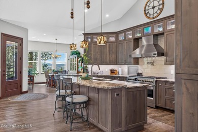 Stunning sunsets frame this custom designed Craftsman that sits - photo 47