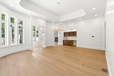 Set on a private peninsula with 600 feet of waterfront, this - photo 15