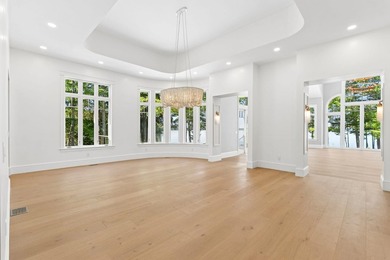 Set on a private peninsula with 600 feet of waterfront, this - photo 16