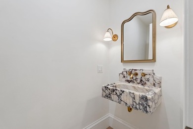 Set on a private peninsula with 600 feet of waterfront, this - photo 17