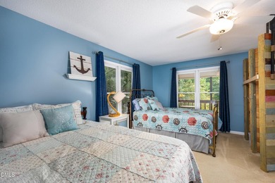 This WATERFRONT retreat on beautiful Badin Lake is the perfect - photo 17
