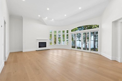 Set on a private peninsula with 600 feet of waterfront, this - photo 18