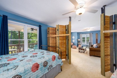 This WATERFRONT retreat on beautiful Badin Lake is the perfect - photo 18