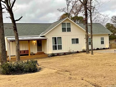 Tucked into a quiet Lake Hamilton cove with 110 feet of deeded - photo 21