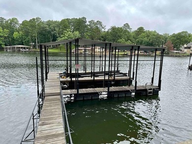 Tucked into a quiet Lake Hamilton cove with 110 feet of deeded - photo 25