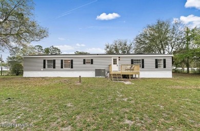 This gorgeous 5 bedroom, 3 full bath home is located an acre! In - photo 25