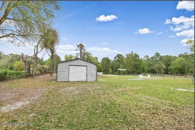 This gorgeous 5 bedroom, 3 full bath home is located an acre! In - photo 27