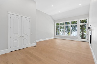 Set on a private peninsula with 600 feet of waterfront, this - photo 29