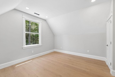 Set on a private peninsula with 600 feet of waterfront, this - photo 43