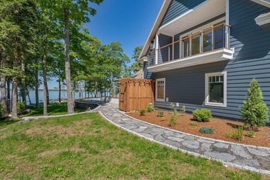 Set on a private peninsula with 600 feet of waterfront, this - photo 47