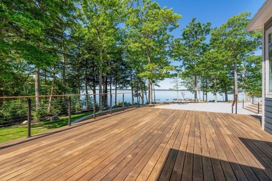 Set on a private peninsula with 600 feet of waterfront, this - photo 50